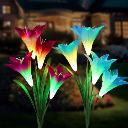 Outdoor Solar Garden Lights, 8 Fleur-de-Lys Multicolor LED Changing Solar Garden Lights on Stakes for Garden, Patio, and Yard (Blue and Purple) - RWE